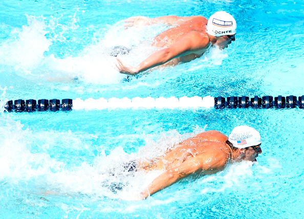 Los campeones Michael Phelps y Ryan Lochte nadando estilo mariposa  en agosto de 2014 en California. (Foto: Harry How/Getty Images)