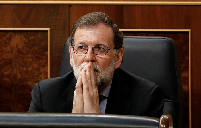  El jefe de gobierno español, Mariano Rajoy, asiste a una sesión plenaria del presupuesto 2018 en el Parlamento en Madrid-España, el 23 de mayo de 2018. REUTERS / Paul Hanna