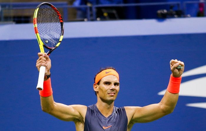 El español Rafael Nadal celebra después de derrotar al austríaco Dominic Thiem en el partido de cuartos de final del US Open de 2018 en el Billie Jean King National Tennis Center de la USTA en Nueva York el 5 de septiembre de 2018. - El campeón defensor Rafael Nadal sobrevivió a una épica confrontación en cuartos de final del US Open para derrotar al noveno sembrado Dominic Thiem 0-6, 6-4, 7-5, 6-7 (4/7), 7-6 (7/5) y llegar a las semifinales por séptima vez. (Foto de EDUARDO MUNOZ ALVAREZ / AFP) (El crédito de la foto debe ser EDUARDO MUNOZ ALVAREZ/AFP/Getty Images)
