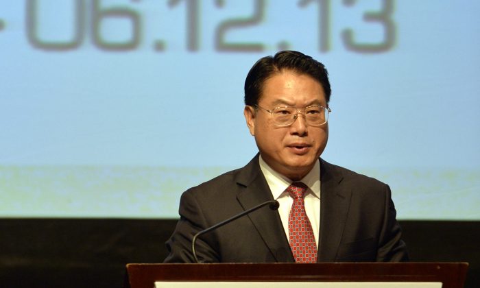 Li Yong, director general de la Organización de las Naciones Unidas para el Desarrollo Industrial (ONUDI), participa en un evento de la ONUDI en Lima, Perú, el 2 de diciembre de 2013. (Cris Bouroncle/AFP/Getty Images)