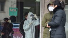 China amplía los cierres, clausura sitios turísticos y el número de muertes por virus aumenta a 26