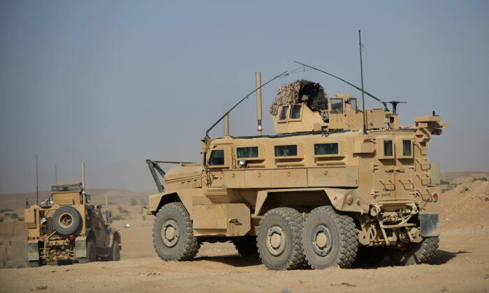 Vehículos MRAP -Mine Resistant Ambush Protected -resistentes a las minas y protegidos contra emboscadas, de los Marines de Estados Unidos. (Adek Berry /AFP/GettyImages)