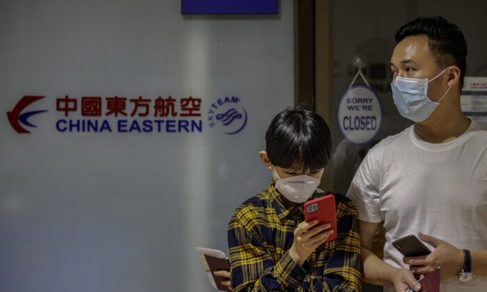 Ciudadanos chinos, cuyo vuelo fue cancelado después de que el gobierno filipino impusiera restricciones de viaje hacia y desde China, en medio del brote del nuevo coronavirus, en el aeropuerto de Manila, Filipinas. Febrero. 3 de 2020. (Ezra Acayan/Getty Images)

