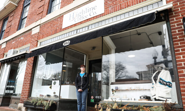 Christie Bruffy, owner of Highline Coffee Co., stand outside her shop in the City of Worthington in Columbus,Ohio, on March 18, 2020. (Charlotte Cuthbertson/The Epoch Times)