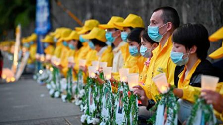 Practicantes de Falun Gong se niegan a ser silenciados y exponen una persecución de 21 años (Fotos)