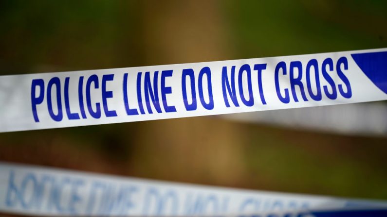 STAFFORD, ENGLAND - FEBRUARY 06: A police cordon surrounds the scene of a house fire in Sycamore Lane, Stafford, which claimed the lives of four children yesterday, on February 06, 2019 in Stafford, England. Police have named the four children who died as Keegan Unitt, aged 6, Tilly Unitt, 4, Olly Unitt, 3, and their older brother Riley Holt, 8. Two adults and another child are being treated in hospital. (Photo by Christopher Furlong/Getty Images)