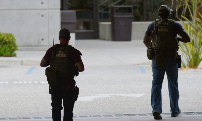 Marshalls de EE.UU. aparecen en una foto de archivo tomada, en Santa Mónica, California, el 7 de junio de 2013. (Joe Klamar/AFP vía Getty Images)