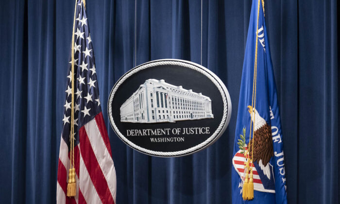 Se ve un letrero del Departamento de Justicia en Washington, el 12 de enero de 2021. (Sarah Silbiger-Pool/Getty Images)