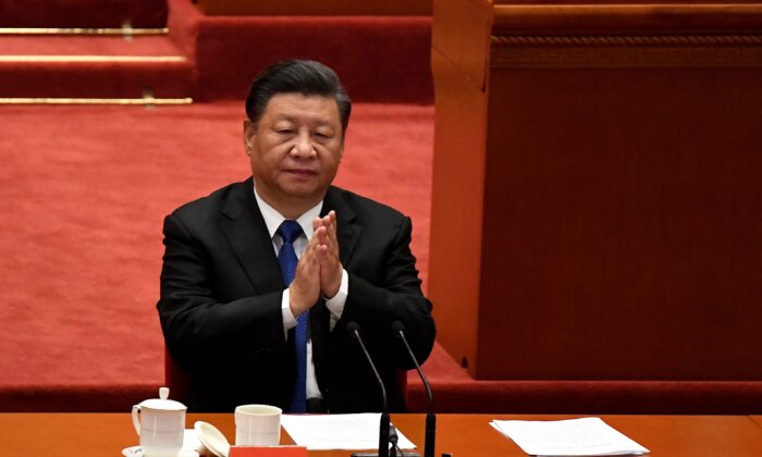 El líder chino Xi Jinping en el Gran Salón del Pueblo en Beijing el 9 de octubre de 2021. (Noel Celis/AFP vía Getty Images)