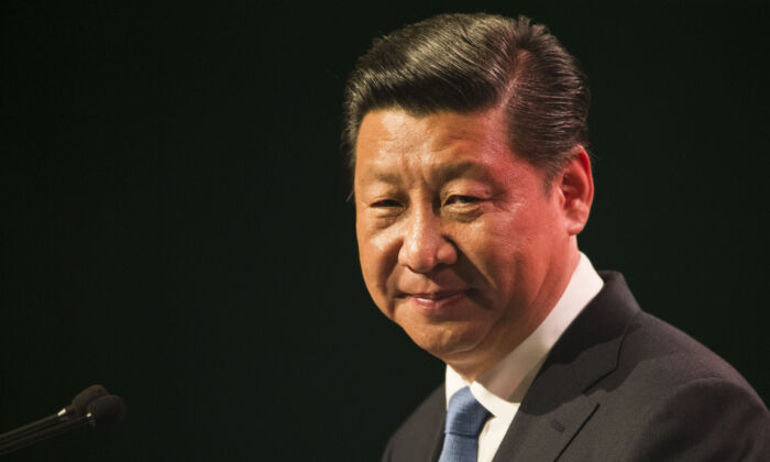 El líder chino Xi Jinping se dirige a la audiencia en un almuerzo en el SkyCity Grand Hotel, en Auckland, Nueva Zelanda, el 21 de noviembre de 2014. (Greg Bowker-Pool/Getty Images)
