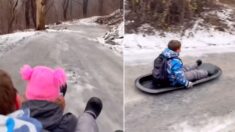 Mamá determinada vence las heladas carreteras invernales y lleva a sus hijos en trineo a la escuela
