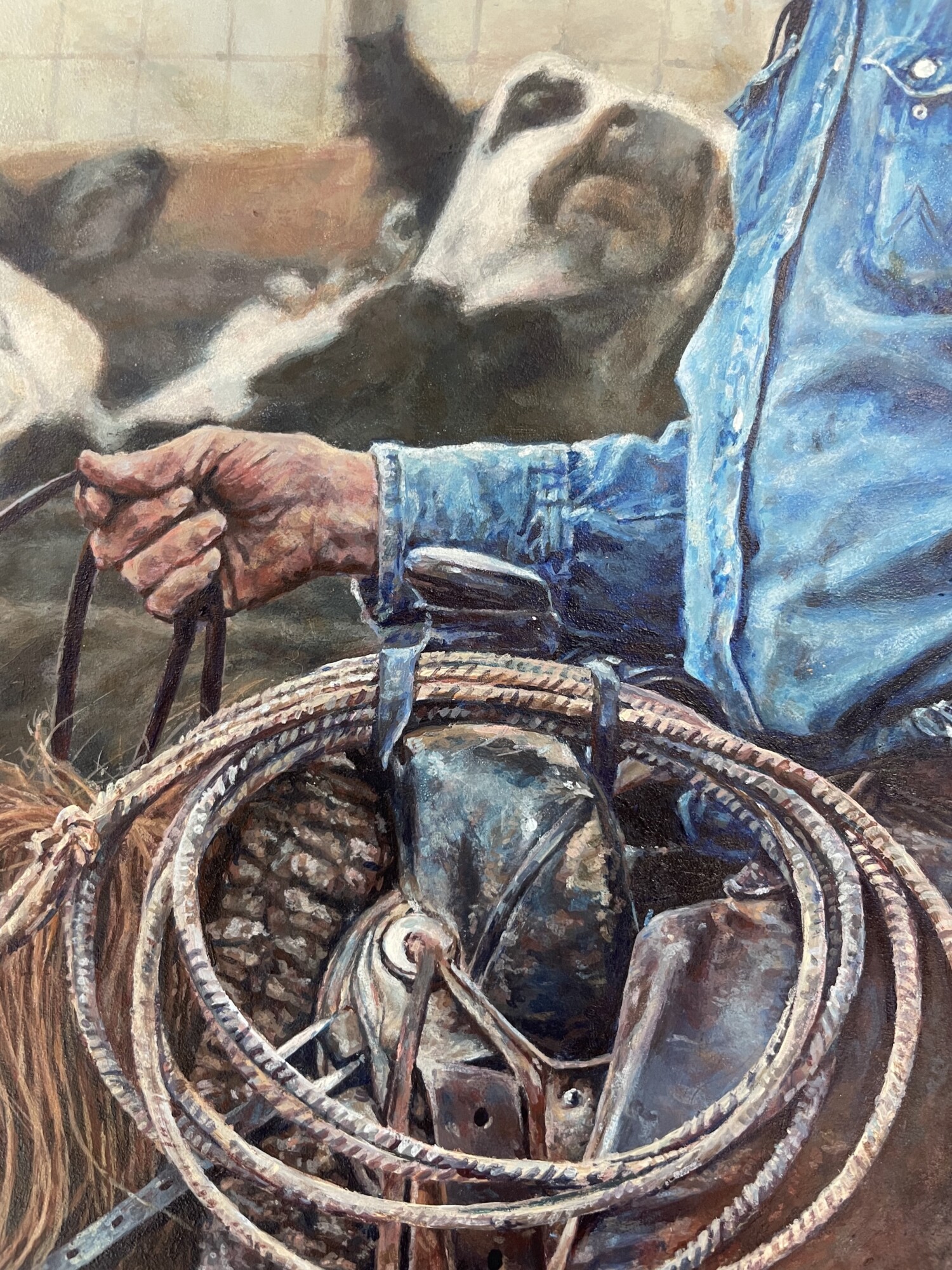 Detalle del fondo y la mano del vaquero en el cuadro de Mia, “Our Last Roundup”. (Cortesía de Mia Huckman)