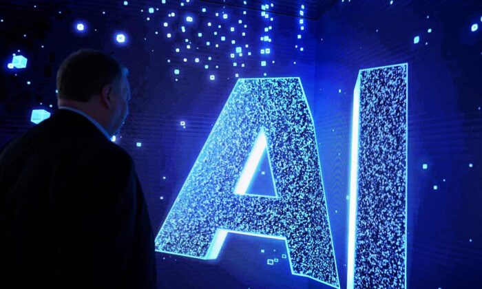 Un visitante observa un letrero de IA (Inteligencia Artificial) en una pantalla animada en el Mobile World Congress (MWC), la mayor reunión anual de la industria de las telecomunicaciones, en Barcelona. (Josep Lago/AFP vía Getty Images)

