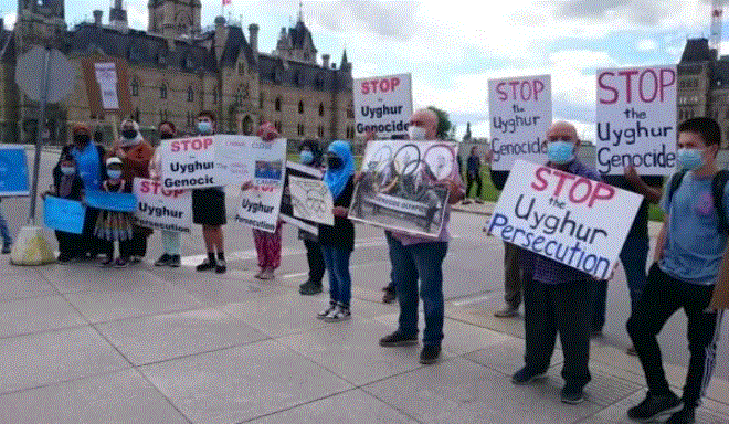 Manifestación contra los Juegos Olímpicos de Invierno de Beijing 2022 en Parliament Hill, Ottawa, el 23 de junio de 2021. (NTD Televisión)