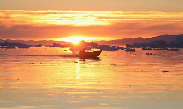 Una foto de archivo de un atardecer en Ilulissat, Groenlandia. (Joe Raedle/Getty Images)
