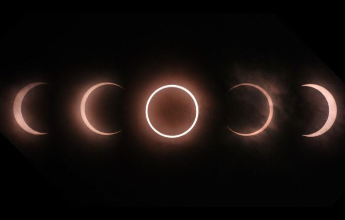 Esta imagen combinada muestra un eclipse solar anular visto desde Tokio el 21 de mayo de 2012. (KAZUHIRO NOGI/AFP/GettyImage)