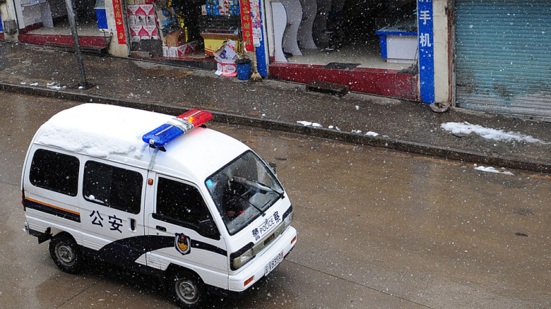 Un vehículo policial de China en una fotografía de archivo. (Frederic J. Brown/AFP vía Getty Images)