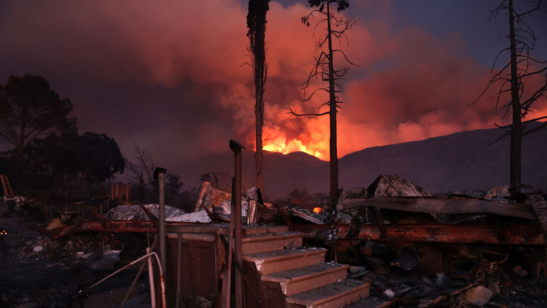 AGUANGA, CALIFORNIA - JULY 29: Stairs remain standing at a destroyed trailer home as the Nixon Fire burns with evacuation orders in the area on July 29, 2024 near Aguanga, California. The wildfire in Riverside County has scorched 3,700 acres thus far. 726,000 acres have burned in California so far this year- more than five times the average for this point in the summer.  (Photo by Mario Tama/Getty Images)