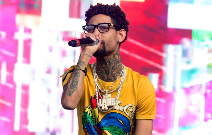 El rapero de Filadelfia PnB Rock actúa en el Firefly Music Festival 2018 en Dover, Delaware, el 16 de junio de 2018. (Owen Sweeney/Invision/AP Photo)
