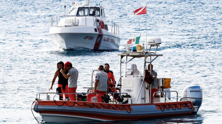 Rescue personnel operate on boats on the sea near the scene where a luxury yacht sank, off the coast of Porticello, near the Sicilian city of Palermo, Italy, on Aug. 20, 2024. Guglielmo Mangiapane/Reuters