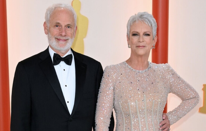 Jamie Lee Curtis y su esposo Christopher Guest asisten a la 95.ª edición de los Premios Óscar en Hollywood, California, el 12 de marzo de 2023. (Angela Weiss/AFP vía Getty Images)
