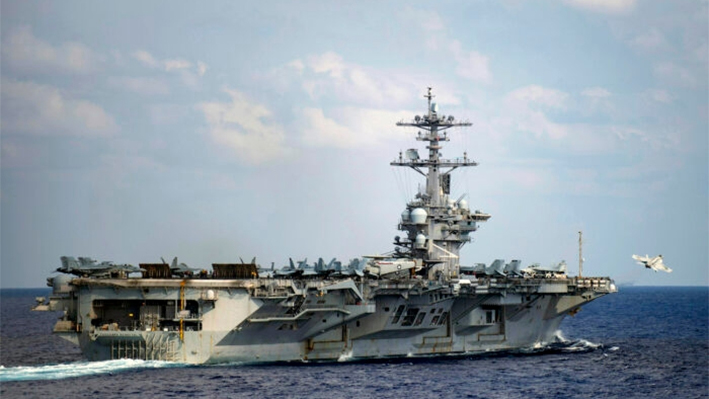 Un F/A-18F Super Hornet despega desde la cubierta de vuelo del portaaviones USS Theodore Roosevelt (CVN 71) en el Océano Pacífico norte occidental el 18 de marzo de 2020. (Mass Communication Specialist 3rd Class Nicholas V. Huynh/U.S. Navy via AP))