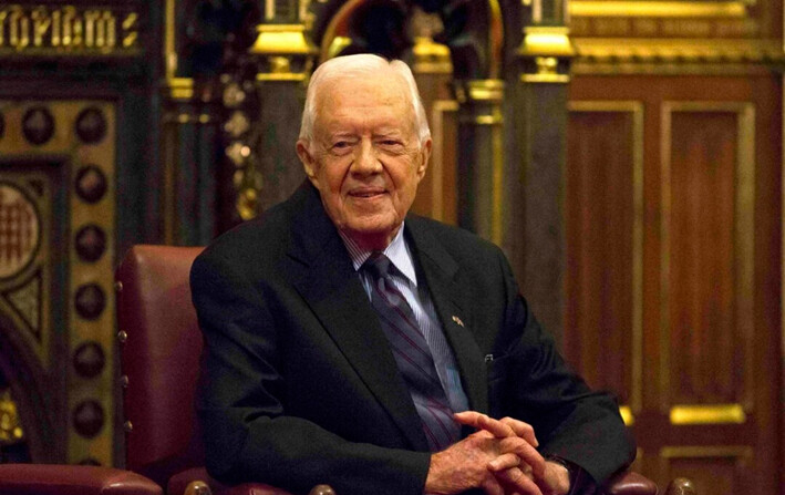 El expresidente estadounidense Jimmy Carter recibe aplausos en la Cámara de los Lores, en Londres, el 3 de febrero de 2016. (Neil Hall-WPA Pool/Getty Images)