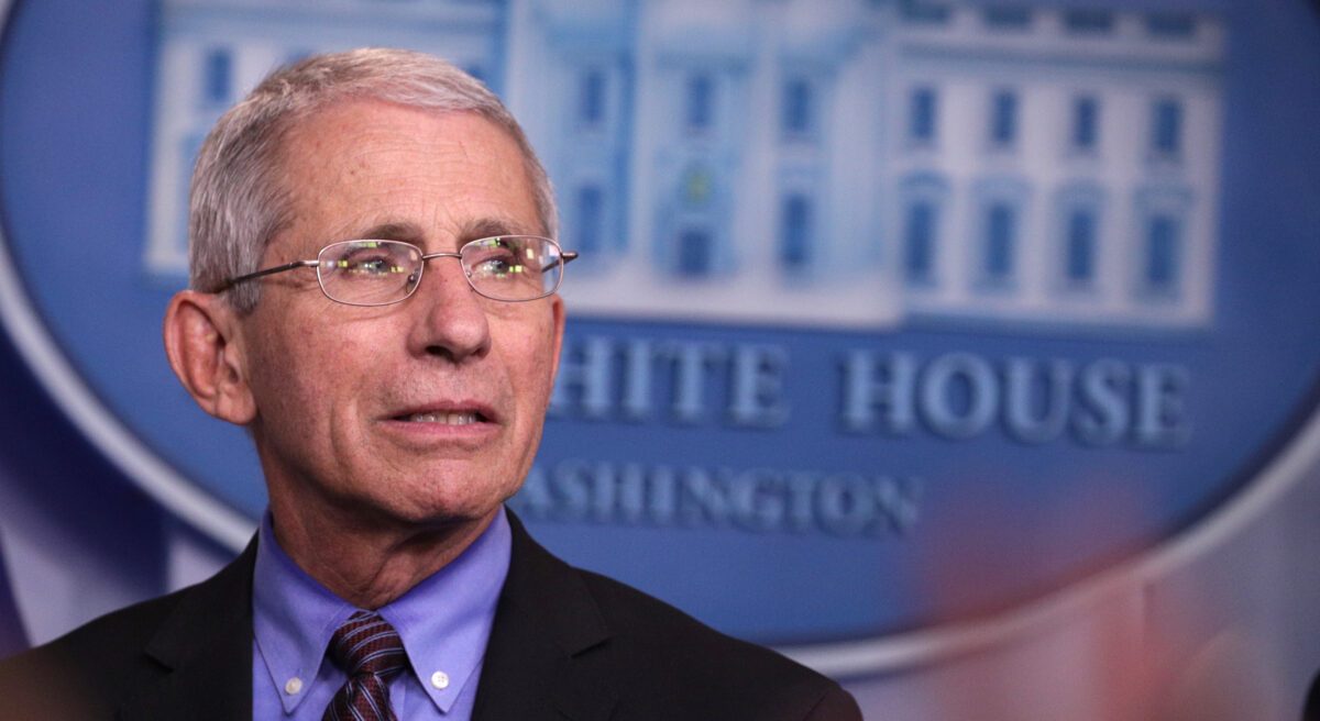 Anthony Fauci listens during the daily coronavirus briefing