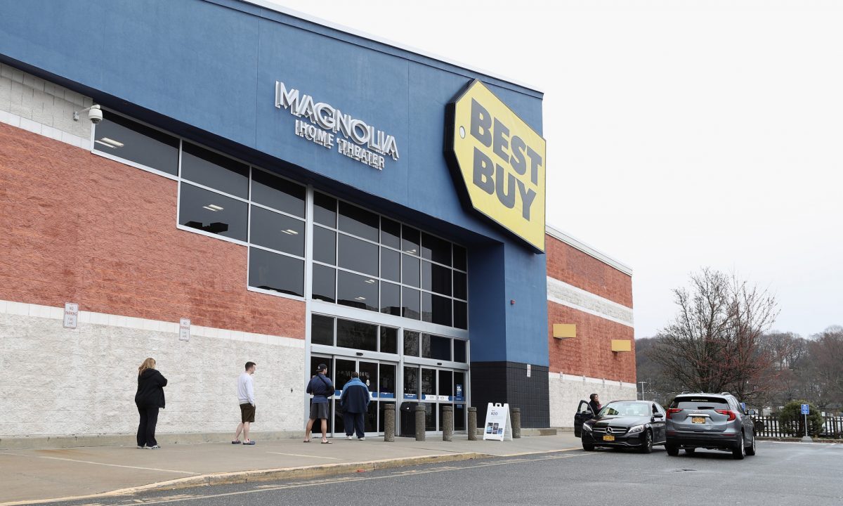 People wait in line at a Best Buy