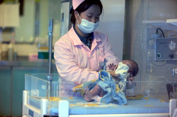 A nurse looks after a rescued baby in a hospital in Xichang, southwest China