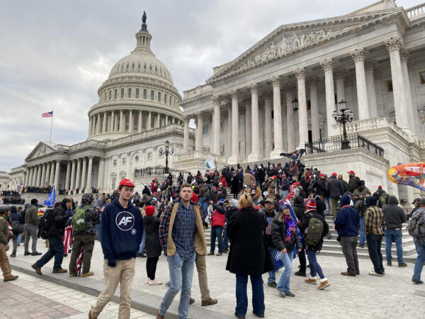 Even after Capitol occupation and violence on January 6, 2021, Capitol Hill Police made no attempt to apprehend "Q Anon Man," who is on the Senate steps just a few feet from the Capitol Hill Police line. This photo was taken after the Capitol Hill Police removed protesters from inside the Senate wing of the Capitol. 