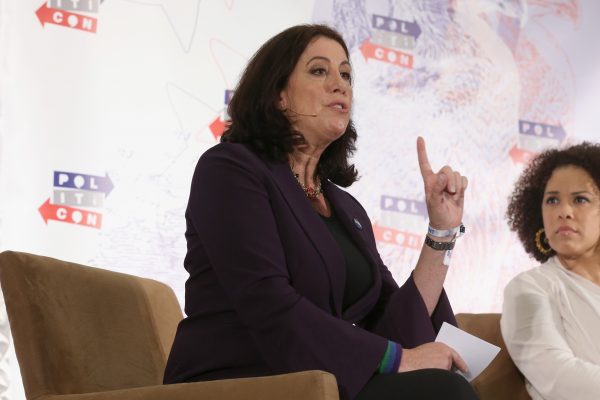 Christine Pelosi (L) and Amy Holmes speak onstage during Politicon 2018.