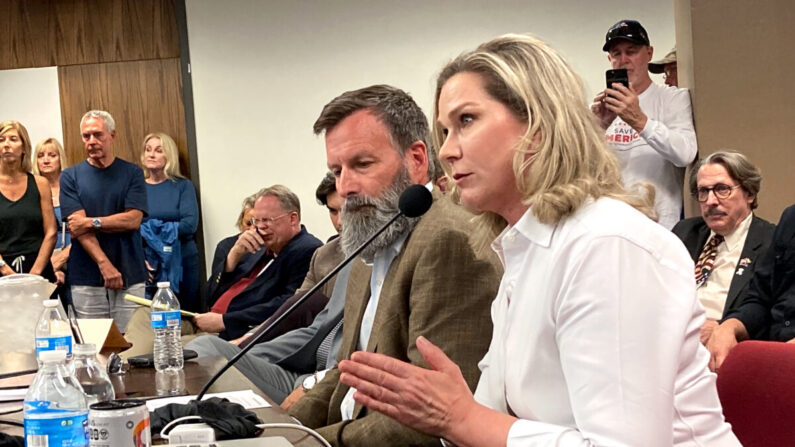 True the Vote founder and president Catherine Engelbrecht makes a point during a presentation on ballot trafficking at the Arizona statehouse on May 31, 2022. Seated next to her is True the Vote data investigator Gregg Phillips. (Allan Stein/The Epoch Times)