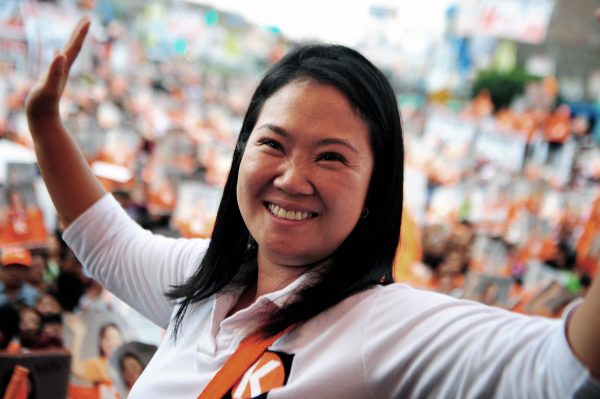 Keiko Fujimori, presidential candidate for the "Fuerza 2011" party and daughter of jailed former president Alberto Fujimori, greets her supporters before delivering a speach in Lima, Peru, on March 25, 2011. (Ernesto Benavides/AFP/Getty Images)