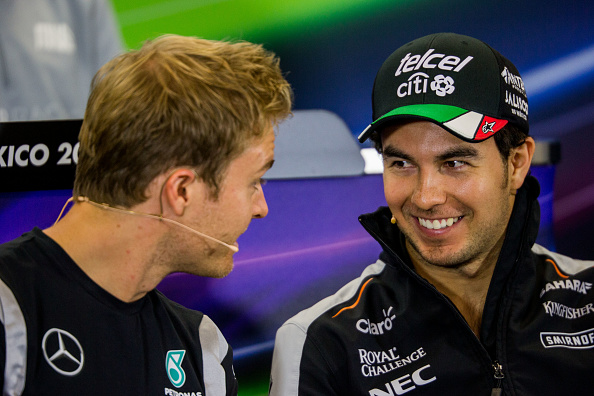 MEXICO CITY, MEXICO - OCTOBER 27: Nico Rosberg of Mercedes and Germany chats with Sergio Perez of Force India and Mexico during previews to the Formula One Grand Prix of Mexico at Autodromo Hermanos Rodriguez on October 27, 2016 in Mexico City, Mexico. (Photo by Peter J Fox/Getty Images)