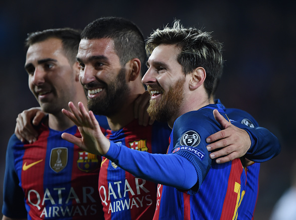 BARCELONA, SPAIN - DECEMBER 06: Lucas Digne, Arda Turan, and Lionel Messi celebrate Turan's second goal during the UEFA Champions League match between FC Barcelona and VfL Borussia Moenchengladbach at Camp Nou on December 6, 2016 in Barcelona, . (Photo by Visionhaus/Corbis via Getty Images)